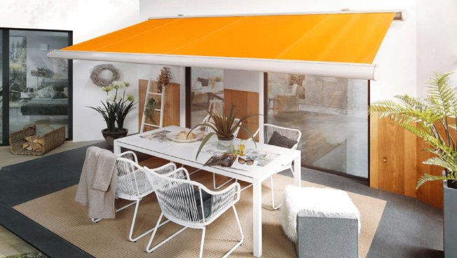 Warema_Kassettenmarkise_K60_1_balkon_orange_Tuch.png